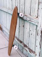 The Nui Pintail Longboard (white wheels)